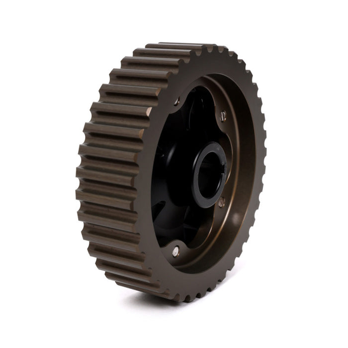 A black adjustable cam gear for Acura/Honda vehicles.