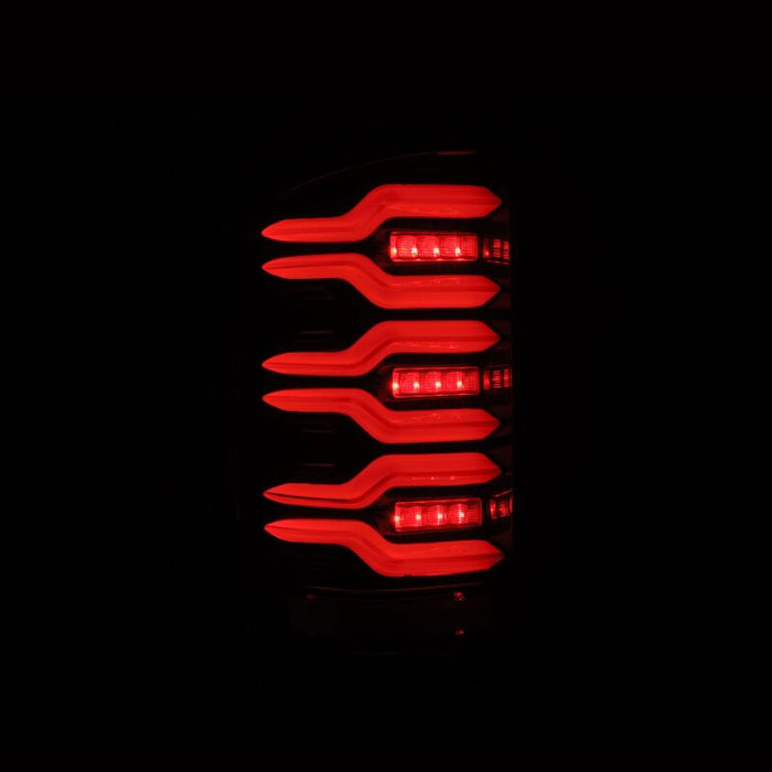 AlphaRex 14-18 GMC Sierra 1500/2500HD/3500HD LUXX-Series LED Tail Lights Alpha-Blk Actv Lgt Seq. Sig
