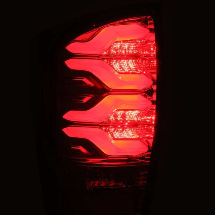 AlphaRex 16-21 Toyota Tacoma LUXX LED Taillights Blk/Red w/Activ Light/Seq Signal